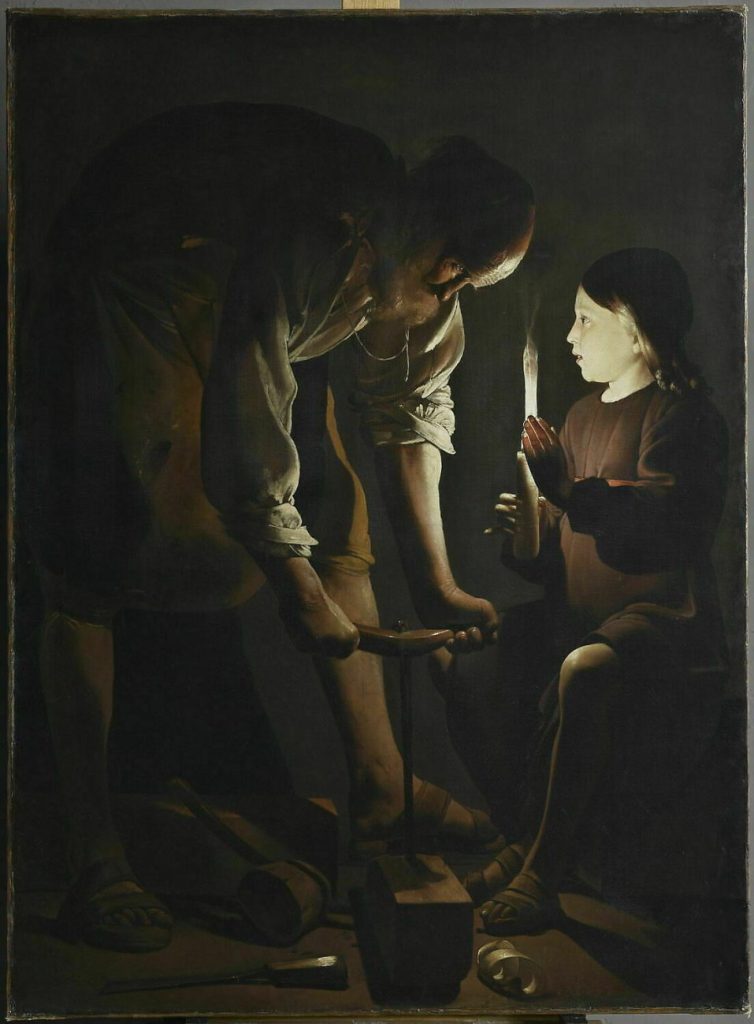 San José trabajando en su taller de carpintero junto al Niño Jesús